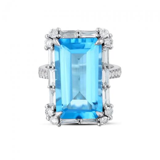 Brillantring zus. ca. 19,10 ct. Ring mit blauem Topas im Baguette-Diamantschliff